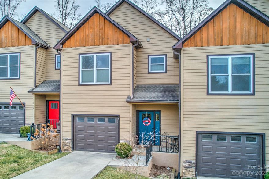 Come and see this modern mountain townhome nestled in beautiful Black Mountain! Well-built in 2018, this is a 3-bedroom, 2-1/2 bath home with high quality finishes including oak floors in all the living spaces, tile baths, and granite countertops. The kitchen has copious cabinets with soft close doors and drawers. All three bedrooms feature high ceilings and walk-in closets. The covered back porch offers a great spot to relax and enjoy southeastern mountain views. Single car garage, plus large crawlspace for storage. Located just minutes from downtown Black Mountain and a short scenic drive from Asheville, this could be the perfect setting for your next chapter!