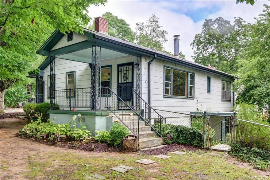 Cute and updated 3/2 in West Asheville located 2 blocks from Haywood Rd! New granite counters in kitchen, new tile floors, updated appliances and more. Lower level has a separate entrance, 2nd kitchen, 3rd bedroom, 2nd bathroom, storage, laundry, perfect for an in-law suite (or potentially rent it out on airBnB?). Fenced yard, 2 covered patios plus a screened-in back porch. 2 car carport for off street parking (plus separate parking area for the lower level). Move-In ready