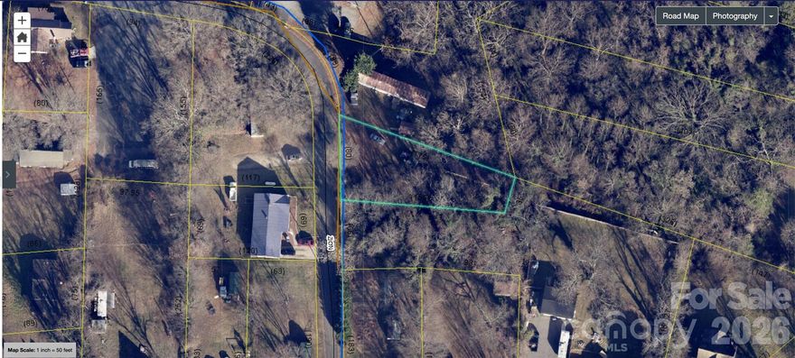 Wooded .218-acre parcel located off Zion Avenue, just minutes from Downtown Taylorsville, 
schools, and local retail. Easy access to NC Hwy 16 provides connectivity to Hickory and 
Lenoir.  Ideal for a manufactured or small site-built home (subject to zoning and site 
approval). Lot will require clearing. Utilities nearby — buyer to verify water/septic 
requirements. Can be purchased individually or packaged with neighboring 65 Zion Avenue for 
expanded development potential.  Investor-friendly pricing in an established residential area.