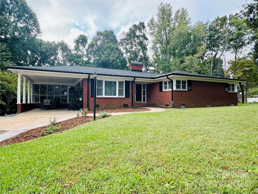 Discover this Charming Home on Private 1.68-Acre Lot Near Charlotte.  Beautiful home set in a peaceful, private location while still just minutes from Charlotte and major highways. This 3-bedroom, 2.5-bath home sits on a stunning 1.68-acre lot, offering both seclusion and convenience. Features: New 2024 Septic system, New 2024 roof and 2023 HVAC system, Water heater installed in February 2021, New gutters, Several rooms including all  2.5 bathrooms have been recently updated,  Enjoy the tranquility of this quiet setting while remaining close to everything. This property offers the best of both worlds!