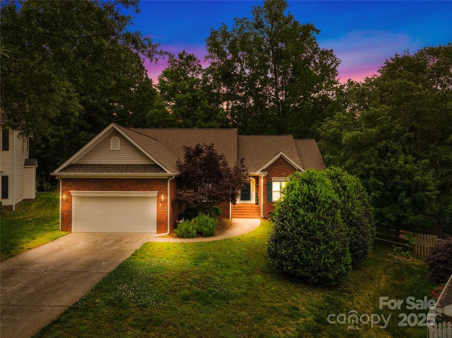 Welcome to a delightful 3-bedroom, 2-bathroom home nestled in the desirable Mitchell Glen/Wildflower Pond neighborhood. Spacious 0.43-acre lot, providing ample room for both relaxation and entertainment. The open-concept floor plan seamlessly connects the living, dining, and kitchen areas, including the large glass window sun room, creating an inviting atmosphere for gatherings and everyday living. The kitchen is equipped with modern appliances, generous counter space, and cabinetry, making meal preparation a breeze. The primary bedroom offers a tranquil retreat with an en-suite bathroom featuring dual vanities, a soaking tub, and a separate shower. Step outside to the private backyard over looking the pond, perfect for gardening, or simply unwinding in a serene setting. Situated in a sought-after neighborhood, this home is close to top-rated schools, shopping centers, dining options, and major highways, ensuring easy access to all that South Charlotte has to offer.