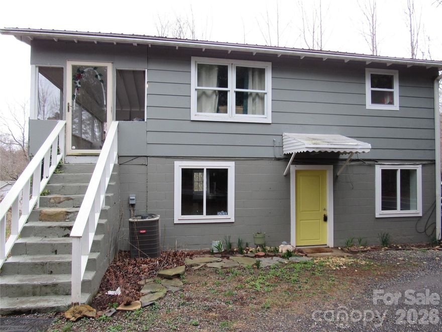 Great investment oppoutunity for someone to live in one unit while your tenant pays your mortgage. This well-maintained property, conveniently located near Lake Tomahawk and within walking distance to downtown Black Mountain, promises not only a comfortable living space but also an excellent investment prospect. Each unit within the duplex comprises two bedrooms and one bathroom, providing comfortable and functional living spaces for residents. Whether you're considering a multi-generational living arrangement, renting out both units, or living in one and renting the other, this versatile property caters to various lifestyle needs.