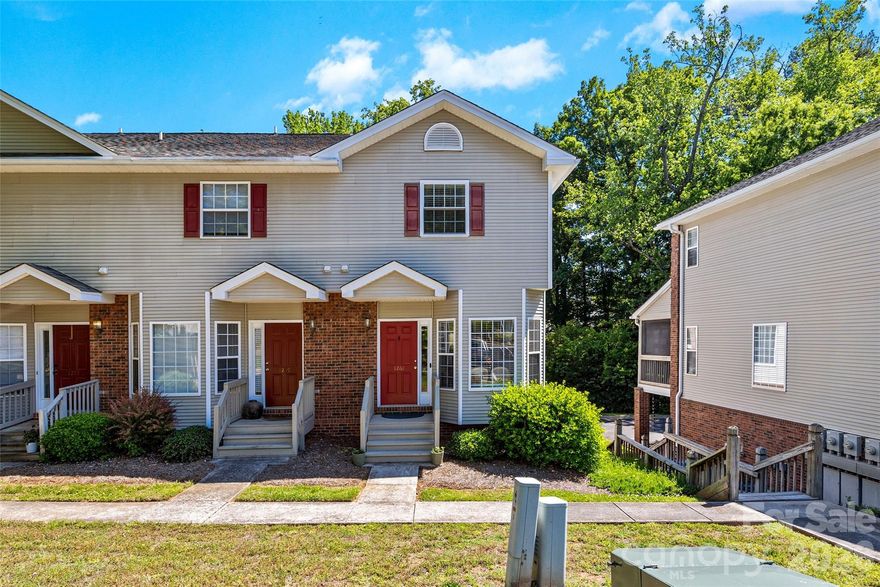 Rarely does a meticulously maintained end-unit hit the market in such a prime location, situated within walking distance of Fewell Park and Winthrop University. This three-story condominium offers a thoughtful layout full of surprises, beginning with a versatile bottom floor that features a one-car garage, ample storage, and a dedicated flex space. The main level serves as the heart of the home, boasting a sunlit kitchen and breakfast nook that flows into a living room anchored by a cozy gas fireplace and a breezy screened porch. Upstairs, two spacious bedrooms each enjoy private full baths and secondary laundry access for ultimate convenience. With stunning hardwoods throughout the top two floors, upgraded countertops, and mostly newer windows, every detail has been polished to perfection. This turn-key property—supported by a $200 monthly HOA that covers exterior maintenance, lawn care, and extermination—is ready to serve as a premier primary residence or a high-value addition to your investment portfolio.