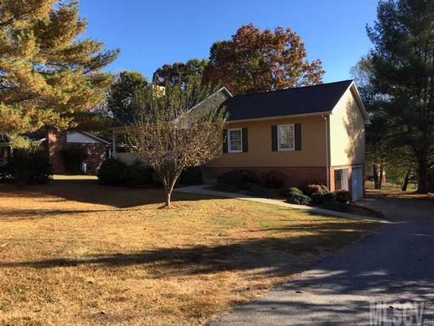 WOW! This home has been remodeled top to bottom and inside & out! Gorgeous ranch with large finished den in basement! New kitchen features beautiful counter tops, cabinetry, island, back splash & more! Separate dr with access to enclosed deck, which tiers down to lower deck! Nice master bedroom and spacious 2nd & 3rd bedrooms too! New hardwoods in lr, dr, kitchen--new carpet in bedrooms and den...new light fixtures, paint, etc. Double garage has brand new doors in basement! Tons of storage. Large back yard only needs fencing on one side to complete an enclosed fence area...Rocking chair front porch!