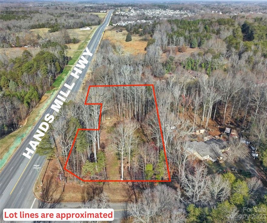 Opportunity awaits on this mostly cleared, commercial lot resting at the corner of the steadily-developing Handsmill Hwy (Hwy 274) and Forestwinds Drive. The Neighborhood Commercial (NC) zoning has a wide variety of uses including office building, medical/dental office, fitness center, insurance agency, etc. York County confirmed via phone that county water is available to this lot. With county sewer not being an option, the seller will install a septic system suitable for up to a 6000 sf building at NO COST to the buyer, with a full price offer. (This is a $42k value!) Don't miss your chance to develop a prime business location off of this bustling corridor (Hwy 274) that links Rock Hill, York, Clover, Lake Wylie and Charlotte.