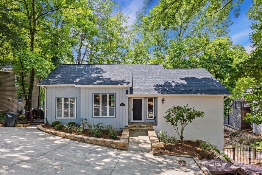 Discover your dream waterfront retreat in the heart of Tega Cay!  This stunning home offers 3 bedrooms and 2.5 baths with lake views from every room. Step inside to an open floorpan that flows nicely from chef's kitchen with gas cooktop, SS appliances, breakfast bar and nook to the formal dining room, and family area with wood burning fireplace, vaulted ceilings, and panoramic views of the lake. The spacious primary suite on the main level with ensuite bath creates a serene escape. Have fun with a second family room and fireplace with built in bookcases, two bedrooms and a large laundry room on the lower level. Outside, enjoy 80' of waterfront property that includes a floating dock nestled in a peaceful cove, oversized decks and a fenced yard. This treasure has a new roof, new HVAC, gleaming hardwood floors, freshly painted inside and out making this home literally move-in ready.  Enjoy the best of Tega Cay - lake life, golfing, parks and top-rated schools all just moments away!