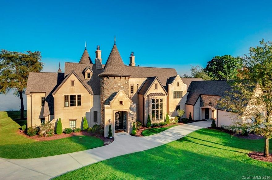 Closed price reflects a 3% reduction due to no buyer's agent commission paid. Absolutely stunning waterfront estate perfectly situated to incorporate main channel views from all living areas & BRs. Chef's kitchen w/2 islands, granite, Viking Prof range & custom maple cabinetry.  Unique layout provides luxury and privacy throughout the 6 BRs, library, media room, theater, secret room, and separate guest house.  Gated entry, 3 car garage, porte cochere.