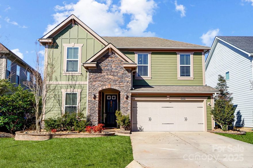 This home is spectacular & has everything! Primary bedroom is on main floor with ensuite bathroom! Ensuite bath has garden tub, double vanities & tiled shower. This 4 bedroom 2 1/2 bathroom home will make you instantly fall in love. Walk in the door & on the left is the dining room with tray ceilings. Gourmet kitchen with oversized island, gorgeous cabinets & granite. Gas appliances. The kitchen is open to the living room and has a gorgeous stone gas fireplace that extends all the way to the high ceiling. Upstairs has 3 bedrooms, a loft and a bonus (theatre) room. All bedrooms have ceiling fans. Check out the back screened in porch! Back yard is fenced in and has a paver patio and paver fireplace. This is a nice sized back yard.  2 yr old solar panels paid off at closing. Low low electric bill!  Newer tankless water heater. Amazing location, award winning Fort Mill Schools & minutes to Charlotte. Lots of amenities!! Pool, clubhouse, playground, walking trails, disc golf course.