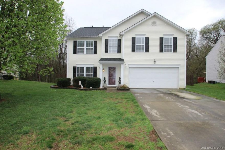 This home features brand new porcelain tile floors that look like hardwoods on the entire first floor.  Gas Log Fireplace in the Living Room.  Office/Study on the main floor.  The kitchen features new stainless steel appliances, New Light Fixtures throughout. Ceramic tile flooring in both full baths upstairs.  Huge Master Suite w/ Sitting Area & very large walk in closets Master bath with a garden tub & separate shower.  Very private fenced in backyard with a nice deck, outbuilding that stays.