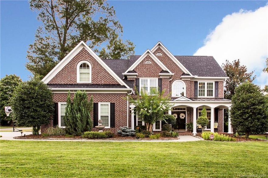 MAGNIFICENT 3 story corner lot home in highly desired Hamptons. KT boasts large center island, quartz counters & tile backsplash. Main floor BR & Full BA. 2 story GR with built-ins. MST suite with sitting area & 3 closets, 1 is a HUGE walk in closet. 3rd floor OVERSIZED bonus with built-ins and custom "fort". Hardwood throughout main. Iron spindle railing. Fence & invisible fenced yard.  Screened porch with stone FP + covered porch in backyard. New windows, roof, HVAC, paint & updated fixtures.