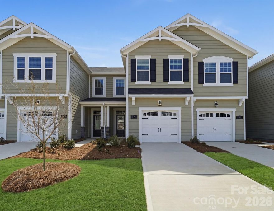 Welcome to The Amira, a beautifully designed townhome offering modern comfort and stylish living.  The first floor features a welcoming front porch and foyer, leading to an open and inviting gathering room.  The spacious kitchen boasts a walk-in pantry, ample counter space, and flows seamlessly into the breakfast dining area.  A powder room and access to the one-car garage add convenience, while the patio provides a perfect out door retreat.  

Upstairs, a large loft offers flexible living space.  The owner's suite is a true sanctuary with a walk-in closet and an en-suite bath featuring a walk-in shower with seat and dual vanity.  Two additional bedrooms, a full-size bathroom, linen closet, and laundry room complete the second floor. 

With its thoughtful layout and modern finishes, The Amira is designed for effortless living.