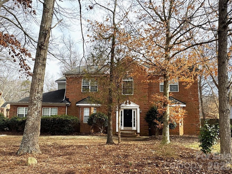 Welcome to 4926 Ardenwoods Drive, a stunning, move-in ready, gem nestled in the established neighborhood of Farmwood. Featuring 4 bedrooms, 3.5 bathrooms, and a versatile bonus-room, this beautifully maintained home is filled with abundant natural light throughout. Situated on a spacious .49 acre corner lot shaded by mature trees, the property offers a fully fenced backyard and a large storage shed. The kitchen is equipped with stainless steel appliances and offers ample cabinet and counter space, making it both functional and inviting. It opens seamlessly to the main living areas, where durable luxury vinyl flooring enhances the space with both style and practicality. Whether you're preparing everyday meals or entertaining guests, this layout provides the perfect balance of comfort and convenience. Conveniently located just 3 miles from I-485 at Rocky River Road, this home offers a private oasis within Charlotte city limits, only minutes from Center City.