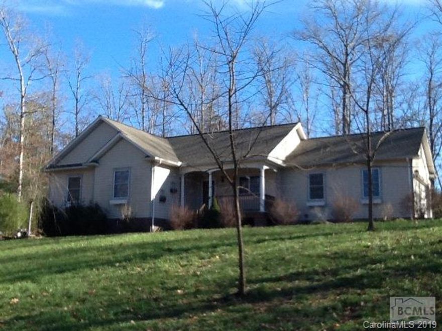 Lovely ranch home in private setting!! All on one-level-living. Beautiful hardwood floors, vaulted ceilings, brick fireplace, granite counters & stainless appliances. MBR has large walk-in closet, bath with jetted tub & separate shower. Screened porch on rear opens to large covered patio for outdoor entertaining! Hardy board on exterior with a front porch to enjoy! Custom built home on nearly 2 private acres! 4787 Denton's Chapel Road $199,900.00