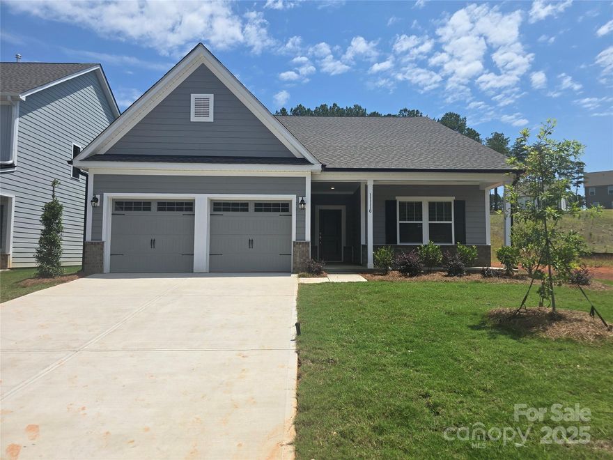 Welcome home to the Montcrest in The Groves at Edgewater. Everything home is welcoming, from the rocking chair front porch to the open layout, spacious kitchen, and screened back porch with extended patio for entertaining. Side walkway from the garage service door to backyard. The luxurious kitchen boasts a huge island with upgraded quartz counters, tile backsplash, gas range, modern pendant lights open to a large great room. Butler's Pantry & large walk-in Pantry. The primary suite with tray ceiling is a private oasis with primary bath with walk-in fully tiled frameless shower & walk-in closet oversized vanity with make-up sitting. Edgewater is home to a top-ranked public golf course, recreational boating & fishing lake, w/many Coming Soon attractions, including fine dining, enhanced golfing & racquet sports facilities, retail shopping & more