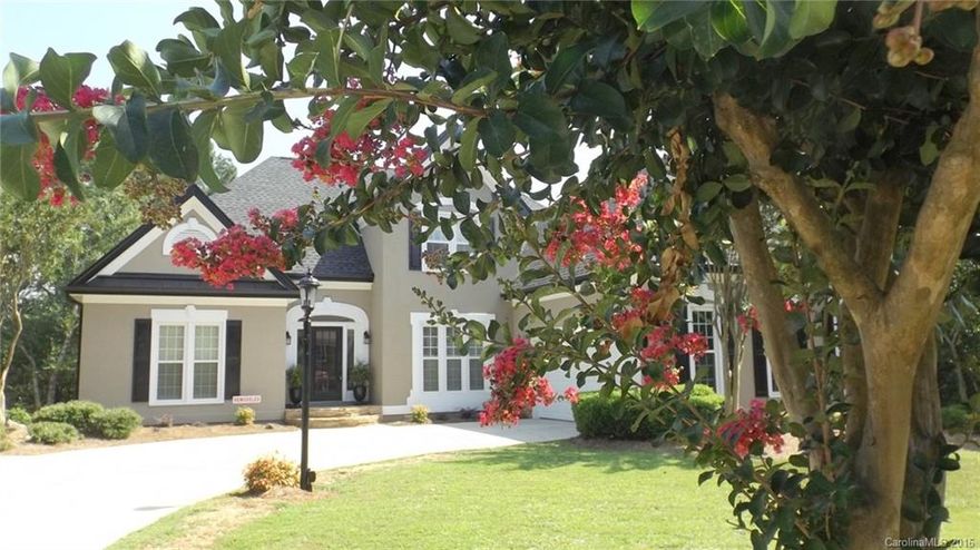 Gorgeous floorplan made for entertaining!  Perfect in every detail with granite countertop, new appliances, new wood floor, freshly painted interior and exterior, new roof, new double pane windows throughout, new water heater, kitchen and bath ceramic tile.  Huge deck overlooking a private back yard and children's play fort.  A must see home!