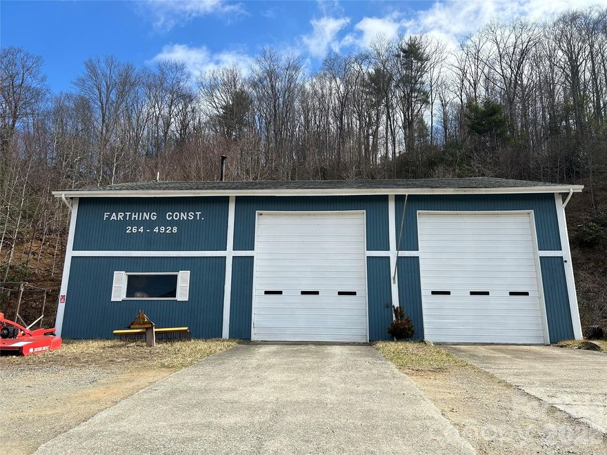 Prime Commercial / Light Industrial Property. Rare opportunity to acquire a versatile commercial/light industrial property with easy access to Highway 421, just outside the Boone city limits. Situated on 2.38± acres with approximately 281 feet of frontage, this property offers excellent accessibility, strong traffic exposure, and significant redevelopment potential. The property features an approximately 3,825 square foot wood-frame industrial building with two garage bays, concrete floors, two offices, and a restroom. The building is serviced by three-phase power, making it well suited for automotive, fabrication, or light industrial uses. This property has operated as a successful business since 1970, offering services such as heavy automotive, heavy and highway road construction, demolition and excavating.  Exterior amenities include ample parking and an additional storage shed, providing flexibility for equipment, materials, or fleet vehicles. The site’s acreage, and proximity to Boone’s commercial corridor create multiple potential uses, including: • Continue the established business • Contractor or equipment facility • Warehouse / service business • Conversion to commercial or contractor storage • Micro-brewery, specialty manufacturing, or destination business • Future redevelopment opportunity. Located directly across from the fairgrounds and speedway, this highly visible property benefits from event traffic and strong regional exposure. Location, visibility, and flexibility make this property a rare commercial opportunity in the Boone market.