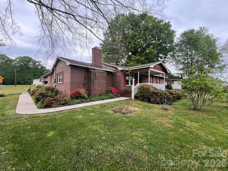 Charming one-story brick ranch with peaceful country living and no city taxes! This well-maintained home features a screened-in porch perfect for relaxing, a fenced yard, and a convenient outbuilding with concrete pad, great for all of your outdoor hobbies and storage. Enjoy four fruit trees that have been prolific, two fig and two apple. The owners have relocated their chickens and bee hive but the space is there should choose to use the it in that way. Spacious layout with great potential, all on one level. Enjoy privacy, functionality, and affordability just minutes from town.
Electrical has been redone as well as new flooring in the kitchen and living room. 
Property is currently listed as a two-bedroom due to incomplete septic records; however, the home was previously sold as a three-bedroom (with septic inspection) and currently listed that way on tax records.