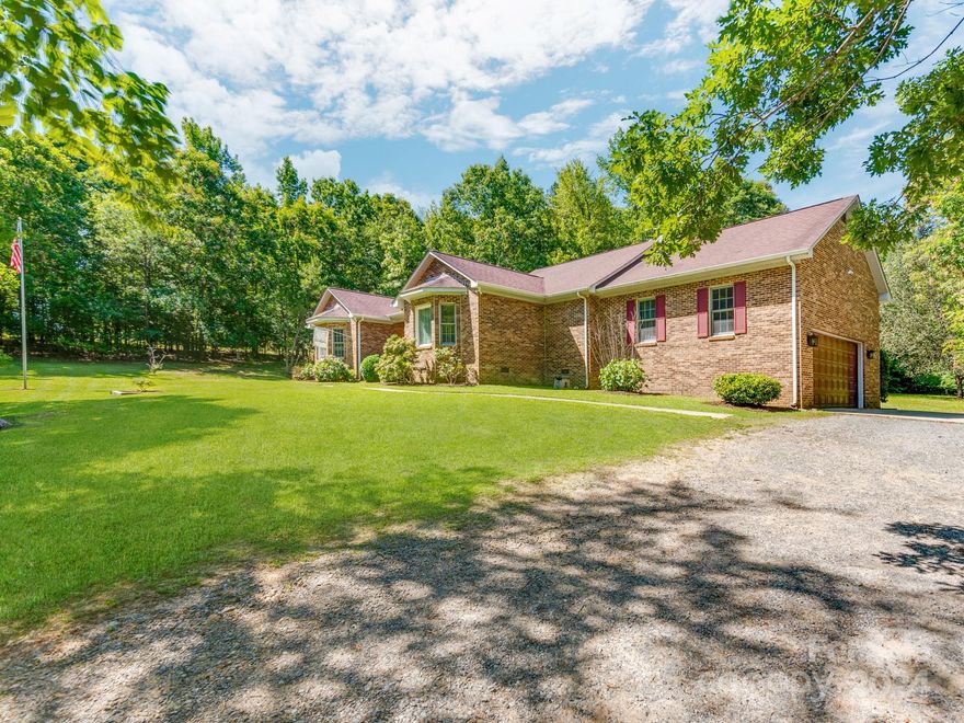 BACK ON MARKET, NO FAULT TO SELLER!!! Completely Private 5.5 Acre All Brick Ranch Style Home in a well sought after location in Rock Hill, SC! NO HOA!  No neighbors to see on any part of this home site! Real hardwood floors and big rooms all throughout! The Master-Suite has a large sized bedroom with big master bathroom! The sunroom is perfect for reading and enjoying the private wooded setting. The Home has an open and airy feel to it with cathedral ceilings in the great room and tons of natural light. This is a rare home and is perfect for those seeking acerage, privacy, and great location! Roof is 3 years old, New Encapsulated Crawlspace with sump pumps, Septic was pumped last year!