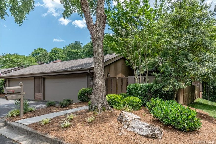 Rare find in So. Charlotte - spacious twnhome w/ a 2-car garage under $300K!  This home sits in a beautiful wooded setting.  Kitchen renovated after purchased in 2003.  Beautiful built-in's added in the living room.  Master bath was changed in 2013 to include a large walk in shower w/seat.  This is a great floor plan with two large bedrooms, living & dining rooms plus den and large eat-in kitchen.  Wonderful outdoor patio on the front and covered back porch.  Over 800s/f of basement storage!
