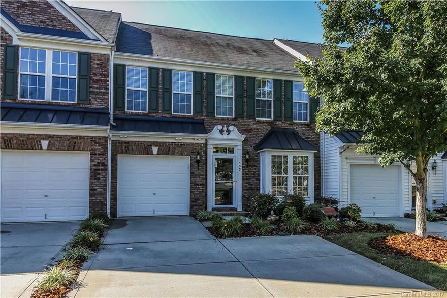 Fort Mill beauty!  Hardwood floors in living areas. Spacious kitchen with ample counter tops and 42" cabinets. Living room has cathedral ceiling and gas log fireplace. Large Master on main level. Separate shower and garden tub. Walk in closest. Massive storage space throughout the home. Upstairs secondary bedrooms are generously sized each with large closets. One car garage with opener, but important - two car driveway width for extra car. Convenient neighborhood in terrific school district.