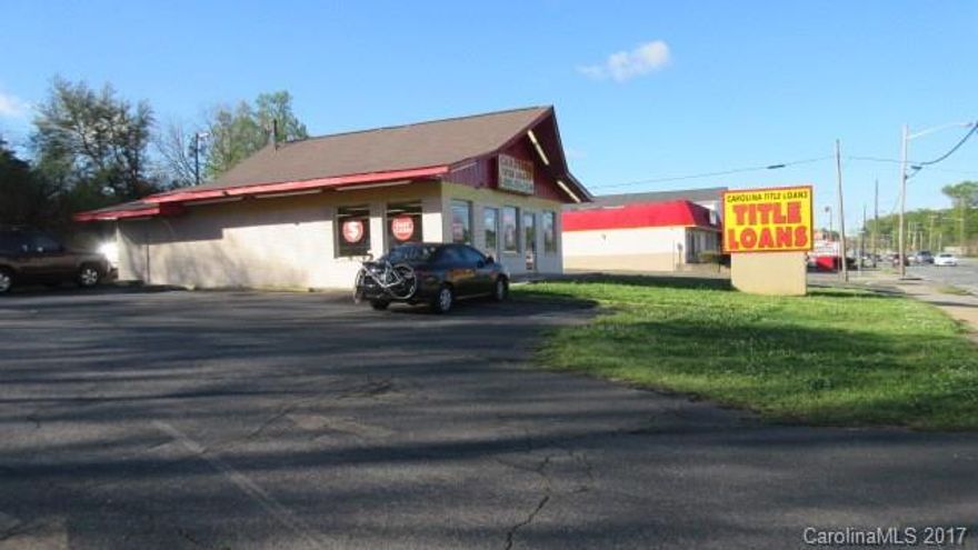 Well located investment property on high traffic retail corridor in Rock Hill, SC. Existing tenant has been at this location since 1996. Long term lease in place.  Strong barriers to entry in Rock Hill for another title loan business make this location strongly desired. General Commercial (GC) Zoning is the most liberal zoning in the City of Rock Hill.