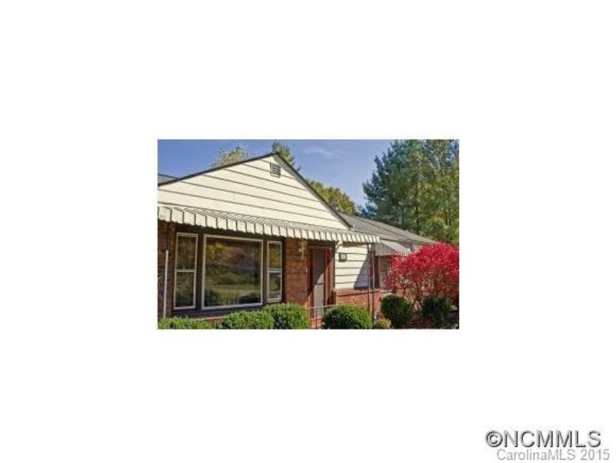 3/2 one level home on spacious corner lot with circle driveway. Split bedrooms with large master suite, Newly remolded kitchen. 5 Year old ORCHARD with mixed fruit trees including plums, apples, pears, persimmons, mulberries. peaches, apricots, cherries, chestnut trees, hazelnut trees, etc. Mature shade trees, but still a sunny location.Quiet Haw Creek neighborhood just six minutes to downtown Asheville. Agent related to seller.