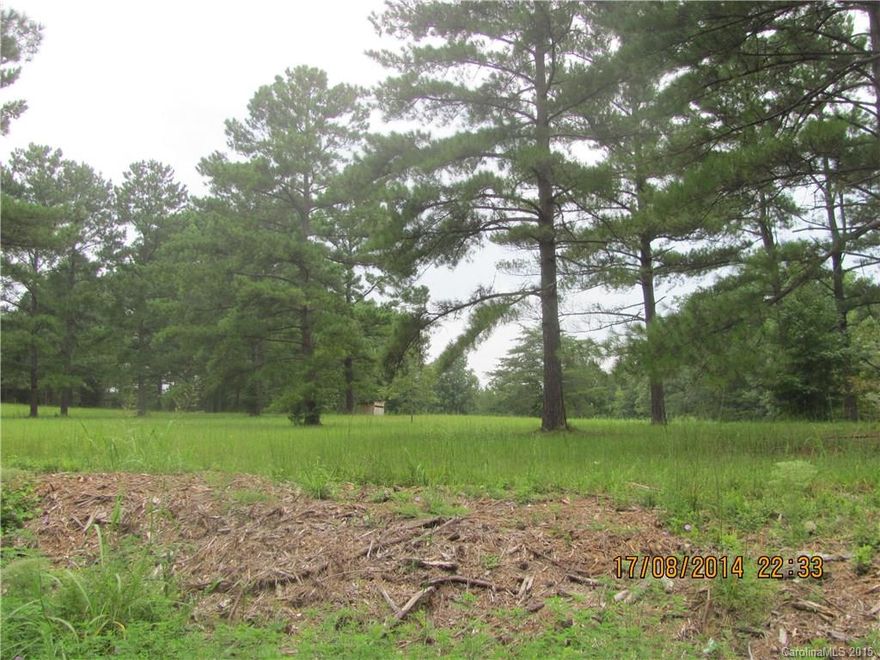 Property being sold in a living estate, 2 individual lots, one 10 acres and one 41 acres making a total of 51 acres. Must be sold together.  Rental mobile home on property is rented for $500 per month.  Fenced pasture and hardwoods with creek. Bring your horses.