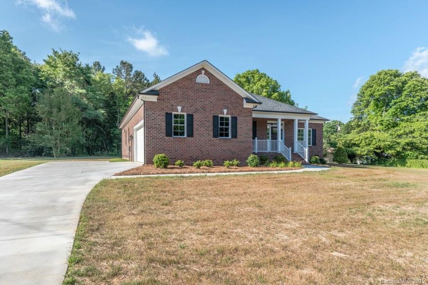 New construction, full brick, custom Vernon Burris home!  .55 acre level corner lot backing to trees. Oversized  side load garage with workshop space. Trane HVAC, 50 gal w/h. Gleaming hardwood floors and extensive moulding! Kitchen features granite counters, stainless steel appliances, large pantry, bar seating, and breakfast room.  Master suite w/ tray ceiling, ceiling fan, master bath with granite counters, dual sinks, and ceramic tile floors. Split bedroom floor plan. Architect shingle roof.