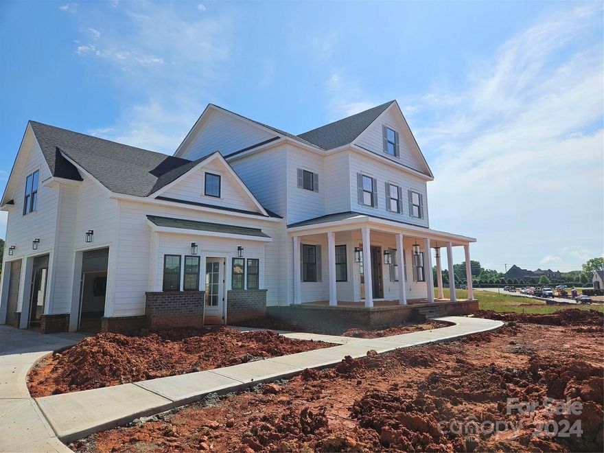 Beautiful American Farmhouse home. Loaded with all high finishes. Wolf Appliances, full music system, central vac, whole house in high end engineered flooring (no carpet!) Sunroom, huge homesite backing up to common area. Welcome to Broadmoor at Marvin. Union county's premier Luxury community. Award winning Marvin Ridge schools!! 5br, 4.5baths.10' ceilings everywhere, 8' doors. Primary suite down plus guest suite down. 5 CAR GARAGE!!
This home will be completed for a quick summertime move in.  
Call Richard for more details.