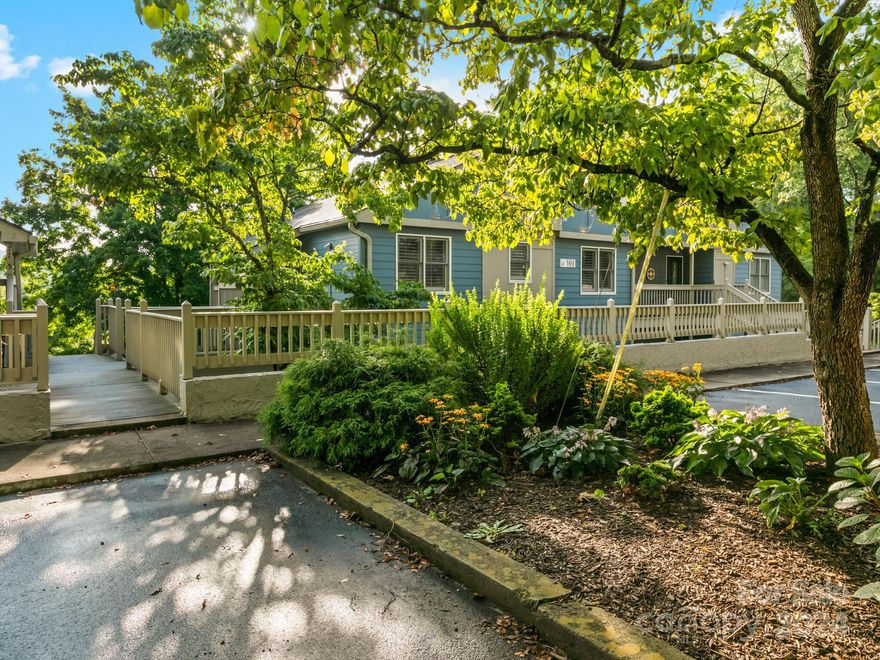 All 1 level, 2 bedroom, 2 full bath condo in Tri-Vista Villas of Lake Junaluska. The 2 designated parking spaces are on Whitfield Way, level with only a few steps to enter. Many upgrades and improvements: complete heating and cooling system, hot water heater, luxury vinyl waterproof flooring, LED recessed lighting, ceiling fan fixtures, popcorn ceiling removed, washer and dryer, both bathroom vanities and extra bathroom storage. Additional features include granite counters in kitchen, wood burning fireplace, a large outdoor covered back porch with additional built-in storage room. An additional storage space is available in the locked basement.