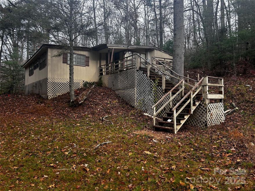 Affordable opportunity near Lake Lure! This unique 4-bedroom, 2.5-bathroom home offers approximately 1,228 sq ft on 0.39 acres along scenic Gerton Highway—right down the road from Lake Lure and Chimney Rock, and convenient to Asheville and Hendersonville. Home features include a metal roof replaced in 2018 stated by the owner, updated breaker box and water heaters installed in 2019, and is partially furnished. Property could also offer potential as a future building site. Enjoy nearby hiking and nature spots. MOTIVATED seller – bring your offer!