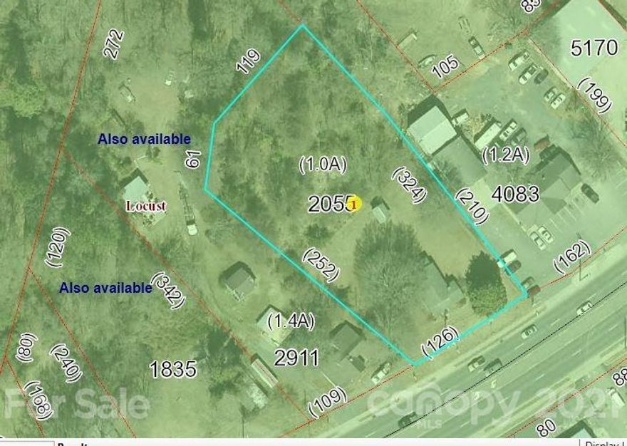 PRICE REDUCED     BRING YOUR BUSINESS OPPORTUNITY IN THE FAST GROWING CITY OF LOCUST?  You are invited to come see this property.  5-lane highway 24/27 with 27,000+/- traffic counts per day.  Beautiful lot and located in business area.  Lot Partly wooded.  House being sold in "AS IS" condition and has not been lived in for years. Only 12 miles from I-485. 
 Locust is issuing lots of new home permits this year so new business's are welcome.  Water is located on property side and available with payment of tap fee.  Sewer is across the street.  Buyer will need to verify with City of Locust for sewer connection.  Seller paid a $300 tap fee in 1997 for sewer connection and she has a receipt for that payment.  Bring us your offer.    Thank you for considering.  Owner will consider all offers.