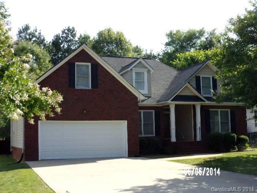 Beautiful ranch style home with hardwood floors and ceramic tile, screened porch, and split bedroom plan. New carpet and fresh paint throughout. Convenient location, great schools and large, flat backyard.