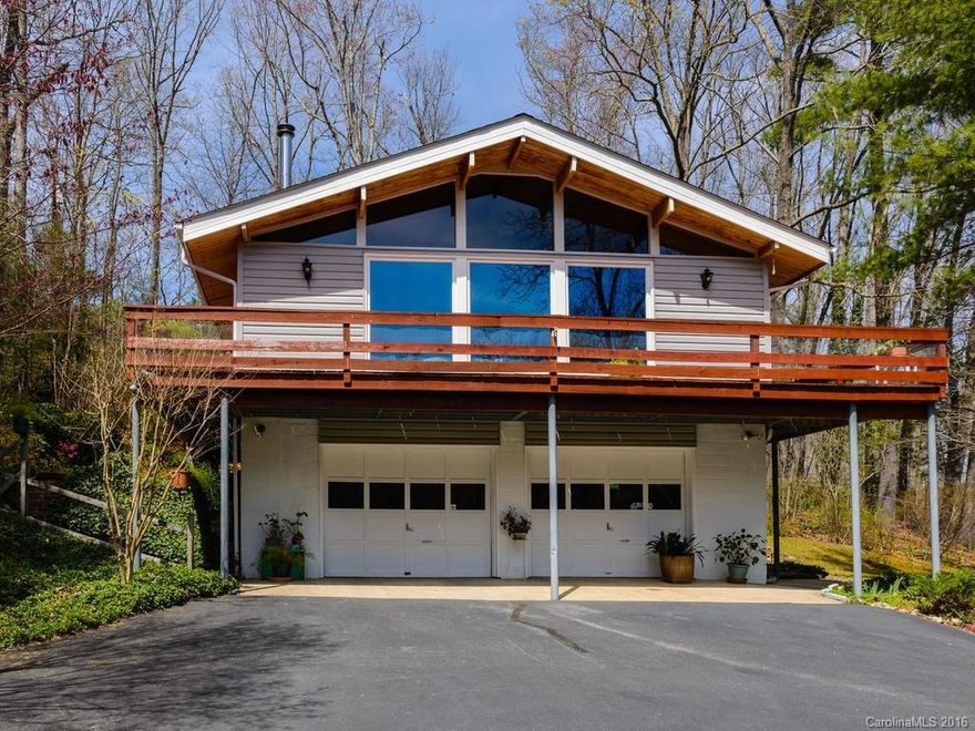 Come home to your own private retreat and enjoy the wonderful views and natural light from three large picture windows thoughtfully placed to capture the natural beauty of living in the mountains. Overlooking Pinnacle Mountain Ridge, this charming and well-maintained 2BR1BA home offers a cathedral-knotty pine beamed ceiling great room with woodstove, well-designed kitchen, roomy bath, an abundance of closet and shelf space and views from all 17 windows in the home.  Two-car attached garage.