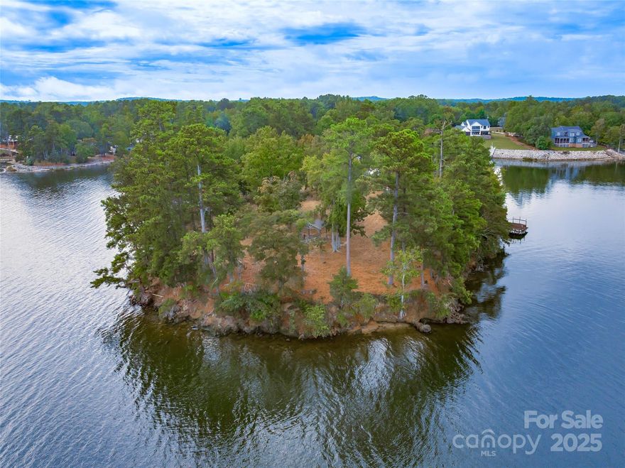 Unbelievable point lot offering 360 degree views of the main channel on Lake Wateree! A truly one of a kind piece of property cleared and ready to go! Build your dream home on the BEST lot on the whole lake! An old dock, well, septic, and electricity are in place but buyer will need to verify condition.