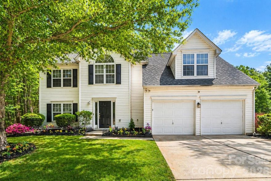 Situated on one of the BEST LOTS IN THE NEIGHBORHOOD, this stunning two-story home offers an abundance living space on a generous 0.31-acre homesite. From the moment you arrive, you’ll be drawn in by the exceptional curb appeal, highlighted by a charming rocking chair front porch and a private backyard with scenic views that truly impress. THIS HOME IS PRICED TO SELL WITH A BANG FOR YOUR BUCK THAT IS HARD TO FIND.

Inside, you’ll find fresh carpeting, abundant natural light, and a functional layout designed for today’s lifestyle. The kitchen is equipped with a gas stove, stainless steel microwave, and refrigerator, making it both stylish and practical.

The oversized great room is incredibly versatile—perfect for a home office, playroom etc. Additional highlights include an architectural shingle roof (2016) and a water heater replaced in 2023. Conveniently located just miles from I-485, this home provides easy access to Charlotte and surrounding areas.

Enjoy fantastic community amenities, including a pool, clubhouse, and playground—perfect for an active lifestyle.