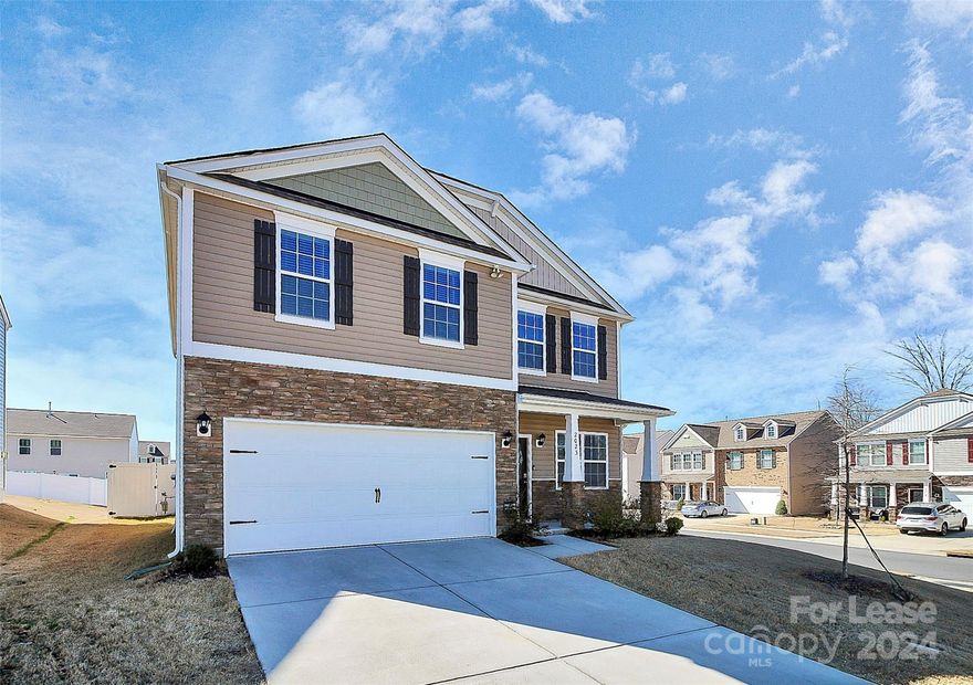 Stunning corner lot 4 bed/2.5 bath home for rent, located in the beautiful Belmeade Crossing community WITH a fully fenced in backyard! Upon entering, you'll love the 9' ceilings + gorgeous LVP flooring throughout the main level. Your spacious + light filled living room has a gas fireplace + leads you into your dedicated dining area (which could also be a play room or home office depending on your needs!). Continuing on, you'll find your kitchen, which has 36" cabinets, granite countertops, SS appliances + a beautiful grey subway tile backsplash! It also provides you access to your large + level fully fenced in backyard, ideal for kids or furry friends with privacy! Upstairs, you'll find the bedrooms, including the primary oasis with vaulted ceilings + walk-in closet. The 3 secondary bedrooms are sizable + share a full bathroom. Conveniently located near the Whitewater Center, Charlotte Airport, Riverbend Village Shopping Center, Uptown Charlotte, University area and so much more!