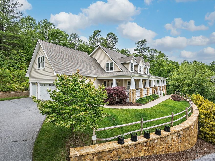 Southnern Traditional home w/spectacular views. Outdoor living abounds w/72X10 covered front porch which also wraps sides. Note the oversize banisters & tongue & groove wood ceiliing. 42X10 screened porch on back surrounded by 1.52 private acres .Extra wide Pella windows to capture views. RANDOM WIDTH sanded on site hdwd floors The magnitude of this home continues w/12X4 kitchen island + breakfast room open to great room. Butlers pantry + huge walk in pantry. bdrm + bath w/walk in shower on main. Don't miss the elevator to take you to other 2 levels. Primary w/dbl door entrance, huge bathrm W/2separate vanities+2 lg walk in closets. Lower level offers family rm, 2 bdrms, bath, theatre rm w/tiered seating for 12 &work out room. After a long day head to the charming wine cellar & hope no one finds you in your hideaway table. Poured concrete foundation. Great turnaround & parking Solid doors.