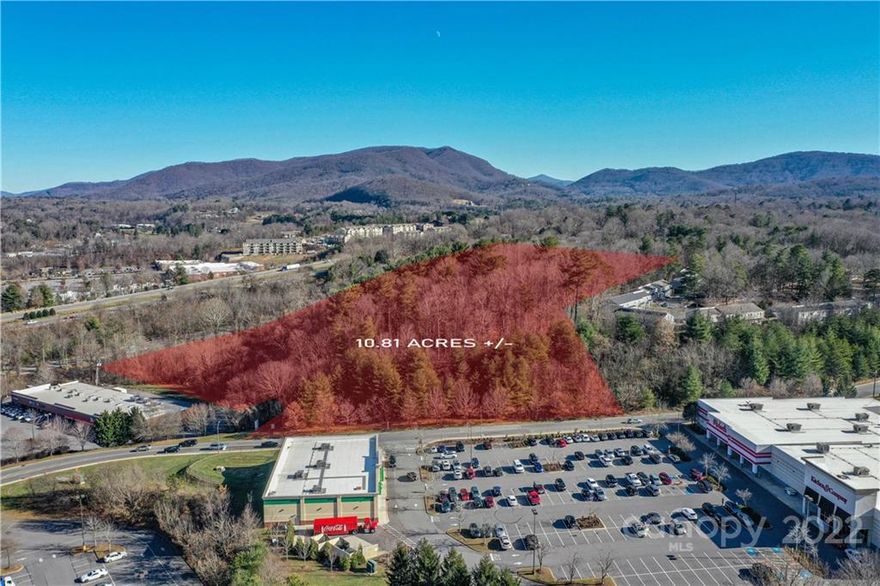 City of Asheville approval complete for a 153 unit apartment complex. Opportunity Zone. 10.9 acre +/- high profile parcel at the end of Tunnel Road in the River Hills Shopping Center next to several national retail brands including Dollar Tree, Target, Michaels, Movie Theaters, and Dick's. . Commercial Industrial zoning allows for many uses including retail, hospitality, multi-family, industrial, or mixed use. Site has great visibility from both directions of I-240 with 52,000 VPD. Recently assembled to frontage along River Hills Road to give access to upper part of the acreage via 400 feet +/- of road frontage. Completed due diligence items available include: Army Corp wetlands delineation, phase 1, Alta survey, project plans, traffic report, and Geotech.