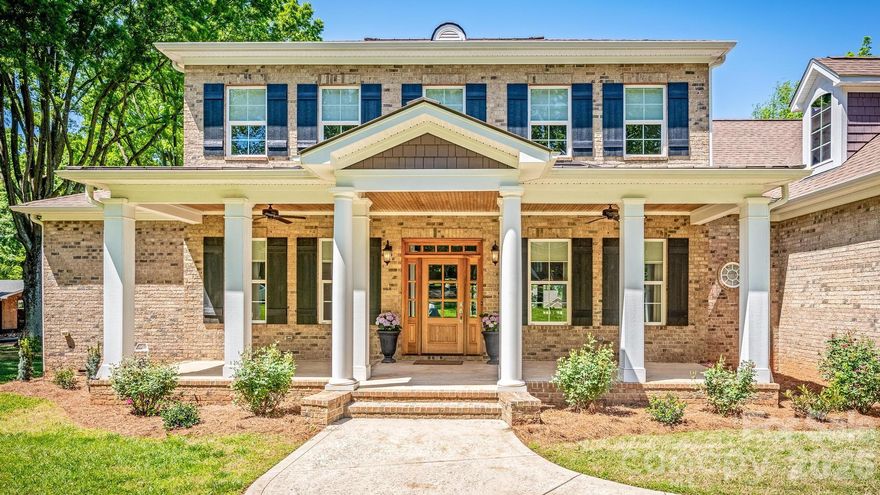 ENJOY YEAR-ROUND WATER VIEWS AND BREATHTAKING SUNSETS! Discover the best of Lake Norman living in this beautifully crafted 4,100-square-foot, full-brick Southern Living–designed home. From the moment you arrive at the expansive covered front porch, you’ll sense the charm and quality that make this property truly special.
Designed with today’s lifestyle in mind, the main level features rich hardwood floors, elegant moldings, and a light-filled, open interior. The flowing layout leads to a spacious gourmet kitchen appointed with granite countertops, stainless steel appliances, a gas range, and a stylish tile backsplash—perfect for both everyday living and entertaining.
The main floor also offers an oversized primary suite with vaulted ceilings and a spa-inspired bath, complete with dual vanities, separate walk-in closets, and a fully tiled walk-in shower. A private office, formal dining room, generous living area with sliding glass doors opening to a screened porch with year-round water views, and a full laundry room complete the main level.
Upstairs, you’ll find two generously sized bedrooms connected by a Jack-and-Jill bath, an additional large bedroom with its own private ensuite, and a versatile bonus room ideal for a media space, playroom, or home gym.
Situated on over three-quarters of an acre with no HOA, this property offers the freedom to enjoy Lake Norman living your way. With access to a boat ramp and boat slip, and plenty of opportunity to add your personal touch, this home delivers space, comfort, and exceptional potential. TAKE A VIRTUAL TOUR: https://tours.auroraphotovideo.com/RkZ9P7Z4