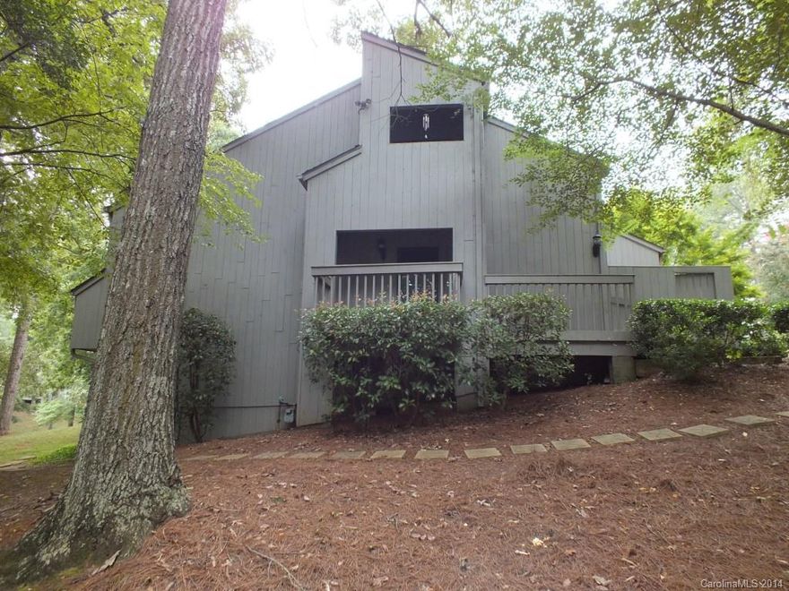 Great end unit town home in a gated community with a lot of amenities. Community has access to pool, country club, and tennis courts. Large MBR with loft and full bath on upper level.  4 bedrooms and 3 full baths.  Home has access to pier.  Priced below tax value!  Move in with equity.  Great Clover school system. Located close to shopping & restaurants.