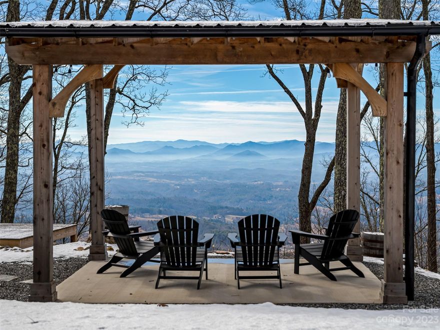 Amazing 137 acre tract 25 minutes from Asheville, NC via I-26W to Bone Camp Road which is 2 1/2 miles west of Mars Hill, NC. There are 4 separate driving entrances into the property with extremely well-maintained interior gravel roads extending to the top of the mountain. Underground pipes providing water drainage accompany the gravel road system throughout. Multiple building sites with magnificent 360° long-range panoramas. Enormous potential for sub-dividing into many high-value view sites or perfect for a family compound. Barn of no value and equipment trailer(s) to convey with sale of property. The land offers mature hardwood timber along with several springs. Approximately 12.5 miles of cleared, maintained hiking and mountain biking trails on property. This Tract
is located close to all the eclectic shops and restaurants that Mars Hill, Weaverville and Asheville has to offer. Do not miss this chance to live in a peaceful, private mountain retreat.