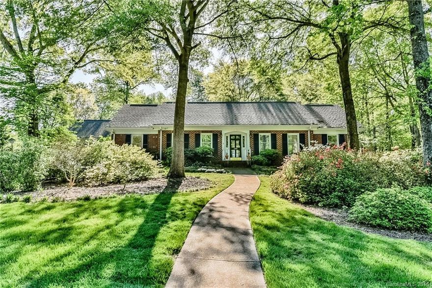 Must see brick ranch close to SouthPark & Arboretum. Newly renovated KT w/custom maple cabinets, adora under mount lighting system, Wolf gas stovetop, Thermadore convection microwave & rotisserie, soft close drawers, walnut handmade island. Sunroom gives view of gardener's retreat featuring bird sanctuary, goldfish pond and easement for neighboring creek.
