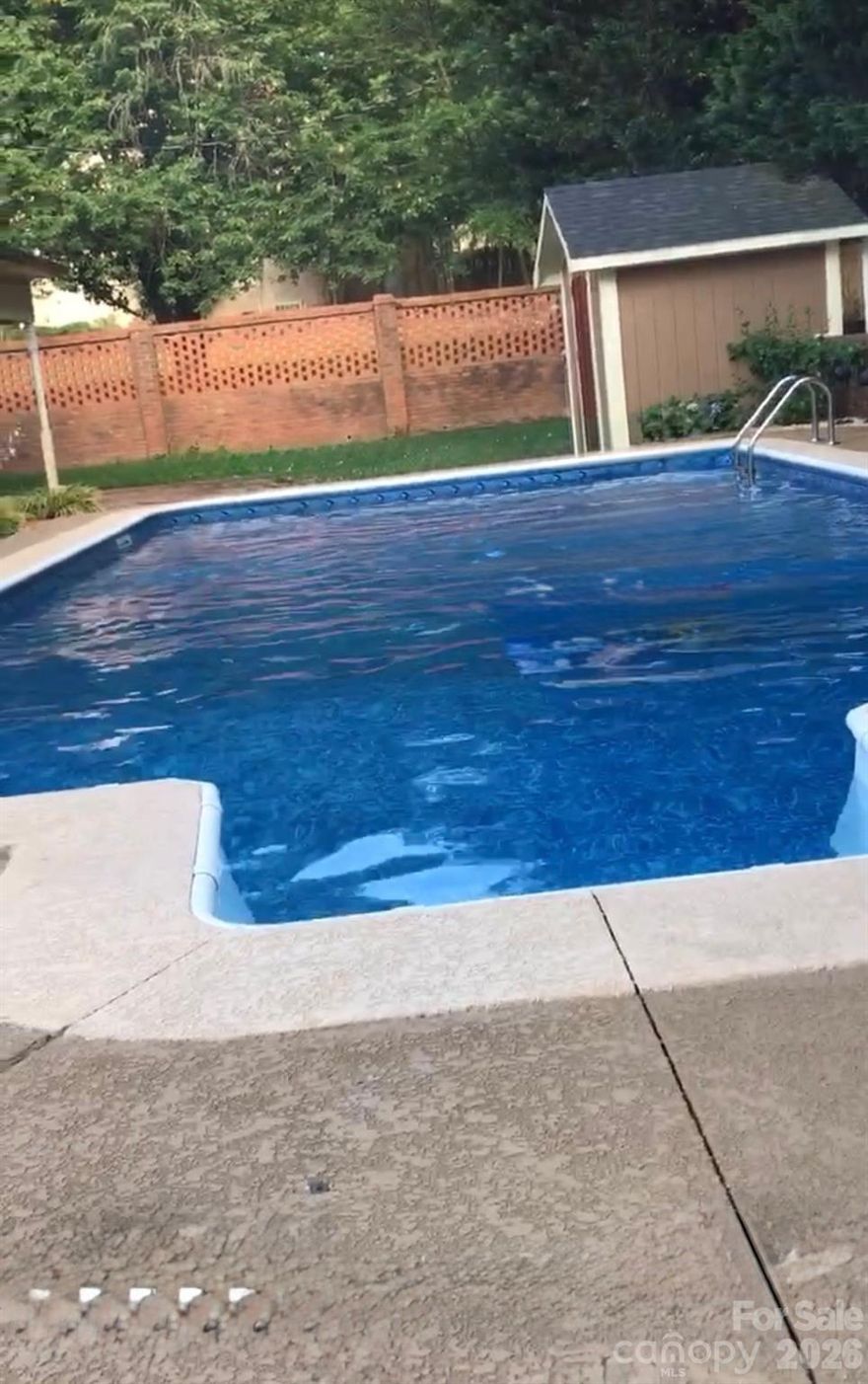 Executive Home with No HOA! Master on the Main with two separate bathrooms in the Primary Suite, Walk In closets and storage everywhere, Brick fence with Remote Control Gate, Inground Salt Water Pool, Fireplace with Gas Logs, Large Kitchen, and don't miss the "SHE SHED"