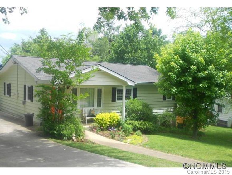 Beautiful home in downtown Waynesville.  One block to Main St shopping and restaurants. Completely remodeled kitchen with Stainless appliances, marble backsplash and quartz composite counters. Formal dining room, updated bathrooms and hardwood floors.  Private partially fenced yard with large garden space and natural gazebo.Very desirable neighborhood.