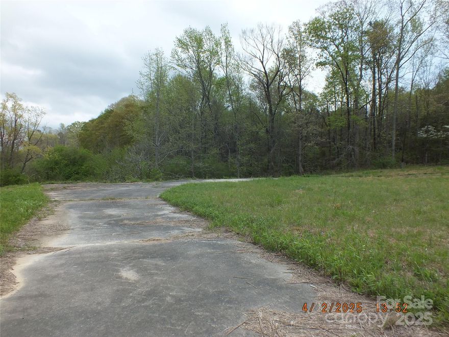 Over one acre of land with county water tap in place, there is a septic on site, seller does not warranty the septic, land already has a circle driveway in place, previous homesite was in the middle with driveway going behind the home. Land is on a gravel road that is maintained by the county, if you come off Hwy 522, turn on Morris Hinson Rd, onto Thornwell, it is just a short distance to the lot, Thornwell Rd goes on and come back out on Hwy 903, which is much longer way. Land is cleared and ready for your new home, modulars are allowed, but not doublewides per the county.