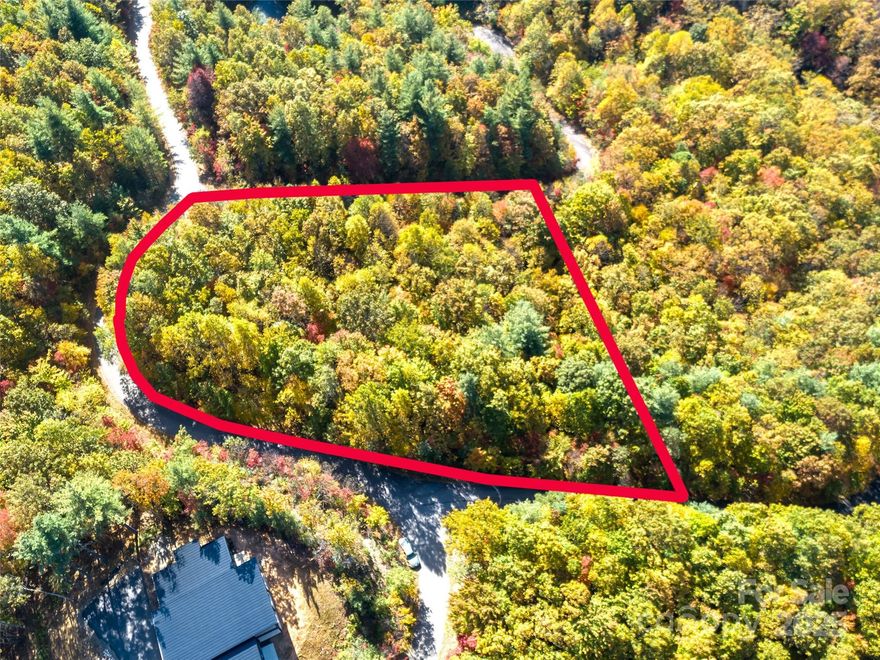 Beautiful and buildable lot for sale in the sought-after Catawba Falls Preserve. This 1. 39-acre lot has everything you need for a peaceful mountain lifestyle—privacy and beautiful mountain views—perfect for building your dream home. Catawba Falls Preserve is a gated community next to Pisgah National Forest, while the nearby Catawba Falls area is open to the public and features a stunning 205-foot Lower Falls and an 80-foot Upper Falls, both accessible through the Catawba Falls trail system. The community offers private home sites and various amenities, and you can even hike to the public falls from within the neighborhood. The falls are a favorite spot for hiking, with a 3. 5-mile loop trail that includes a staircase with 580 steps leading up to an observation tower for the Upper Falls.