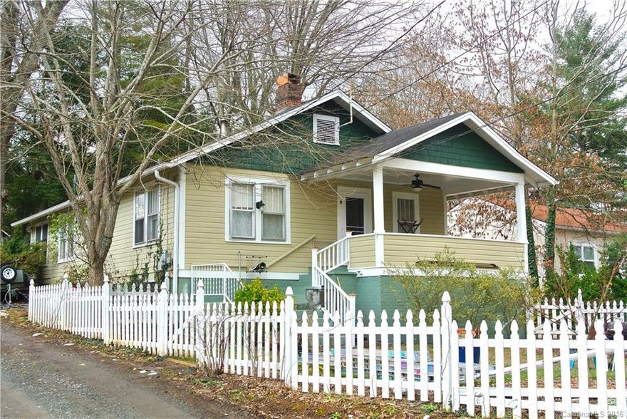 Super cute classic West Asheville bungalow! Just one block from Malvern Hills Park on a quiet street, this home is completely remodeled yet retains original charm. Beautiful kitchen with 5 burner gas stove, stainless appliances, farm sink, pot filler & concrete counters. Updated bath with a clawfoot tub, large walk in shower & honeycomb tile. Cozy wood stove in living area, laundry facility in convenient mud room. Perfect front porch overlooks the fenced yard. Detached single car garage.
