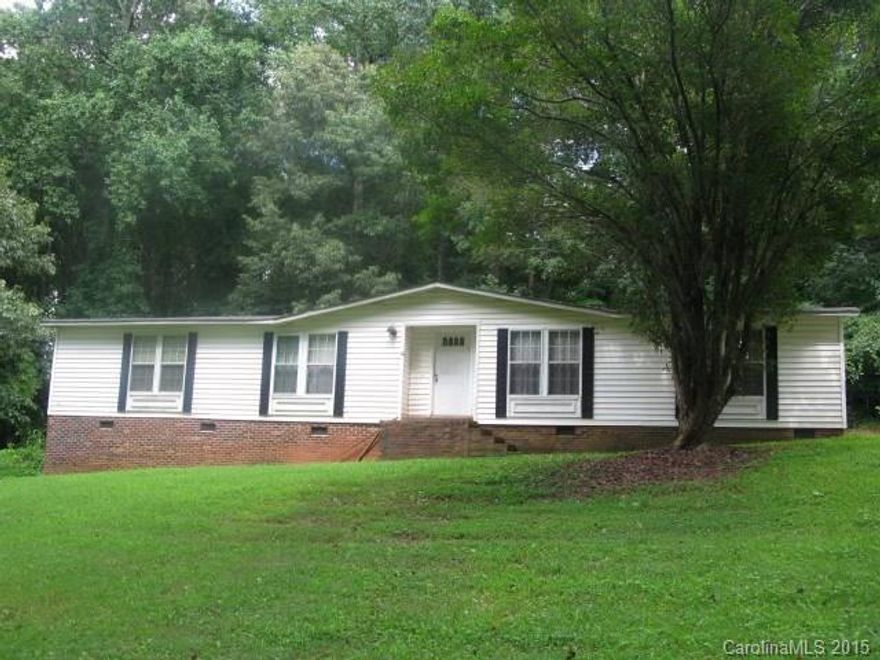 Must see. Huge yard, partial wooded , close to schools, shopping, Davidson college and I-77. Home is great for first time buyer or an investor. Needs some TLC. Ready to move in. This listing consist of 3 lots that add up to 1.53 acres.