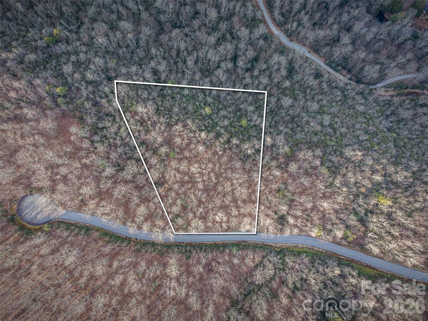 Located in Lake Toxaway Estates, this nearly 4-acre homesite offers an exceptional opportunity to create a private mountain retreat. With its generous size and natural topography, strategic building and selective clearing may open up beautiful views of Lake Toxaway, adding long-term value and enjoyment to the property. Surrounded by mature hardwoods and the peaceful sounds of nature, the lot provides privacy, flexibility, and ample space for a thoughtfully designed home that blends into the landscape. Ownership in Lake Toxaway Estates includes access to North Carolina’s largest private lake, along with an array of amenities such as championship golf, tennis and pickleball courts, hiking trails, and dining.